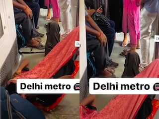Metro Ka Video: लड़के ने मेट्रो की फर्श पर बिछा दी बोरी, फिर गमछा ओढ़कर सो भी गया | देखें वीडियो