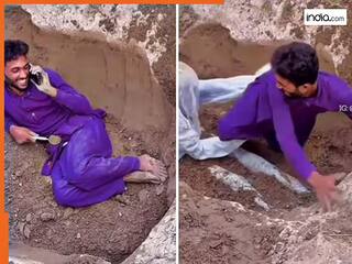 Viral Video Today: गर्लफ्रेंड से बात करते-करते खोद दी जमीन, फिर मुर्दे से पड़ा ऐसा पाला हिल गया बेचारा | देखें वीडियो