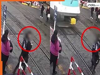 Train Ka Video: रेलवे ट्रैक पार करने लगा मोबाइल में डूबा शख्स, फिर जो हो गया अंदर तक हिल जाएंगे | देखें वीडियो