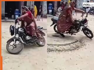 Dulhan Ka Video: लहंगा पहनकर बाइक पर स्टंट करने लगी दुल्हन, नजारा देख राहगीर तक चौंक गए | देखें वीडियो
