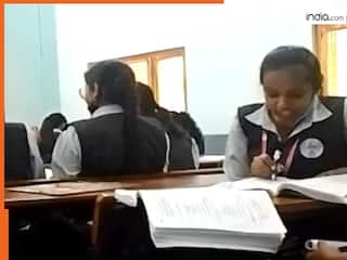 School Girl Ka Video: छात्रा की किताब पर अचानक आ गई छिपकली, फिर जो हुआ सोच-सोचकर हंसेंगे | देखें वीडियो