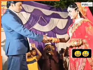 Bride Groom Video: जयमाला के स्टेज पर अचानक ये क्या कर बैठी दुल्हन, अंदर तक हिल गया दूल्हा | देखें वीडियो