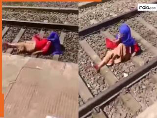 Ladki Ka Video: प्रेमी से बात करते हुए ट्रेन के नीचे आ गई लड़की, जिंदा बची तो फोन से फिर चिपक गई | देखें वीडियो