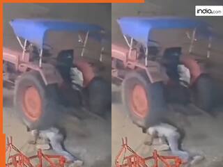 Viral Video Today: धक्का लगाते समय ट्रैक्टर के नीचे आ गया ड्राइवर, फिर जो हुआ आंखें फटी रह जाएंगी | देखें वीडियो