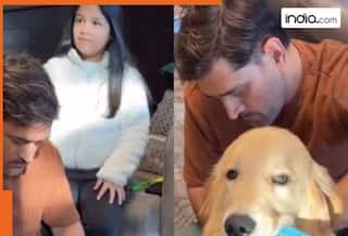 WATCH: MS Dhoni and daughter Ziva share adorable 'Therapawtic' moment grooming their pet dog