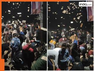 अचानक आसमान से होने लगी नोटों की बारिश, सब काम छोड़ लूटने को भागे लोग, देखें Viral Video