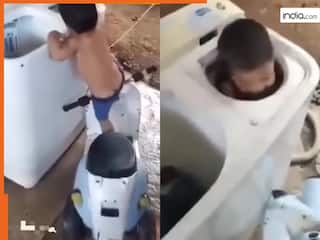 Viral Video: ऐसा शरारती बच्चा नहीं देखा होगा, मजे के लिए वॉशिंग मशीन में ही घुस गया | देखें वीडियो