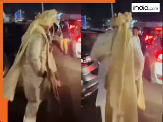 Dulhe Ka Video: ट्रैफिक में फंसी गाड़ी तो 'Milkha Singh' बन गया दूल्हा, सज-संवरकर लगाई दौड़