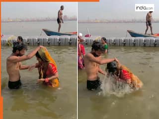 Maha Kumbh Video: स्नान के बहाने पति-पत्नी का मस्तीभरा ड्रामा, देखकर कहेंगे- ये तो फुल एंटरटेनमेंट है!