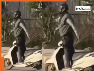 Viral Video: स्कूटी पर खड़े हो अंकल करने लगे योगा, वीडियो देख उड़ गए लोगों के होश | देखें वीडियो