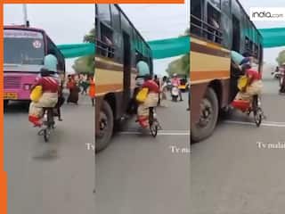 Jugaad Ka Video: शख्स ने चलती साइकिल से बस में चढ़ा दिया परिवार, जुगाड़ देख हिल गए लोग | देखें वीडियो