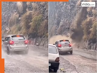 पहाड़ों पर तेज रफ्तार में दौड़ रही थी कार, अचानक सामने हुआ लैंडस्लाइड! वीडियो देख उड़ जाएंगे होश