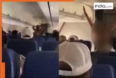 WATCH: Woman strips naked, parades inside plane screaming for 25 minutes due to..., video viral