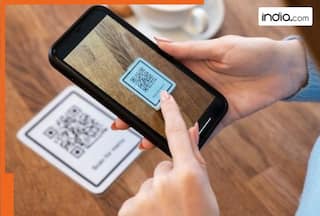 Who invented the QR Code that is now used in UPI payments and Aadhaar verification? He is from..., name is...