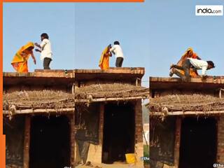 Husband Wife Video: बेवजह झगड़ा करना पति को पड़ गया भारी, पत्नी ने छत से ही फेंक दिया | देखें वीडियो