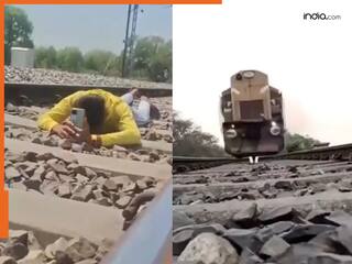 Viral Video: रील बनाने के लिए रेल की पटरी पर लेटा शख्स, फिर जो हुआ उड़ गए सबके होश