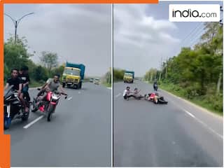बाइक को सांप बनाने की कोशिश पड़ी भारी, बैलेंस बिगड़ा, सड़क पर रेंगने लगे युवक! देखें Viral Video