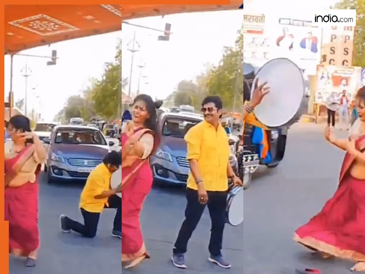 Viral Video Today: रील के लिए शख्स ने पत्नी को सड़क पर नचाया, खुद बजाने लगा डफली | देखें ये वीडियो