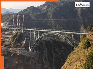 Chenab railway bridge, taller than Eiffel Tower, is constructed by..., its cost Rs...