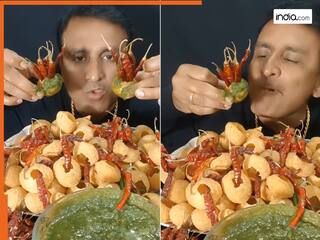 Viral Video Today: हरी मिर्च से मन नहीं भरा तो लाल मिर्च ले आया बंदा, गोलगप्पे में ठुसकर लगा खाने | देखें वीडियो