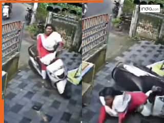 Scooty Girl Ka Video: घर में ही गिर पड़ी स्कूटी गर्ल, लोग बोले- टाइल्स की गलती है | देखें वीडियो