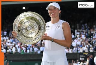 Iga Swiatek lifts maiden Wimbledon title with 6-0 win over Amanda Anisimova