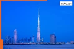 Which is world's most beautiful building? It is built on 42 acres, attracts millions of tourists every year, it is..., located in..., not Burj Khalifa in Dubai