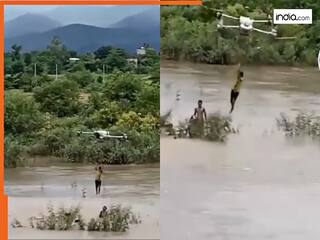 Drone Ka Video: बाढ़ में फंसे बच्चे के लिए 'देवदूत' बनकर आया ड्रोन,  मिनटों में खींच लाया बाहर | Viral हुआ ये Video