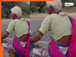 Dadi Ka Video: सड़क पर तेज रफ्तार में बाइक चलाती दिखी बूढ़ी महिला, वीडियो देख लोग बोले- दादी के स्वैग के आगे आजकल के लड़के भी है फेल..देखिए