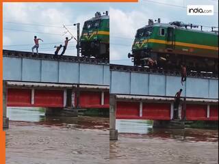 Stunt Ka Video: चलती ट्रेन के सामने लड़कों ने किया जानलेवा स्टंट, तीसरे ने तो हद ही पार कर दी | देखें वीडियो