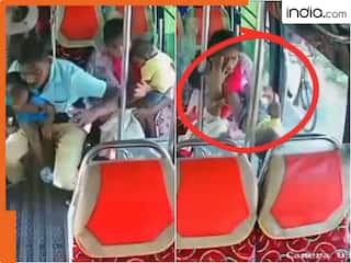 ब्रेक लगते ही मां की गोद से फिसला मासूम, बस के दरवाजे से बाहर जा गिरा बच्चा – Viral Video देख कांप उठेगा दिल!