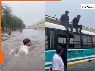 Delhi Rains: दिल्ली की सड़क बनी स्विमिंग पूल! बारिश के बाद लोग जमकर पानी में तैरते और मस्ती करते नजर आए