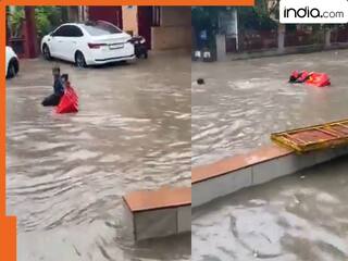 एक बारिश और गुरुग्राम की सड़कें बन गईं स्विमिंग पूल, पानी में तैरते दिखे बच्चे, वायरल वीडियो दिमाग हिला देगा
