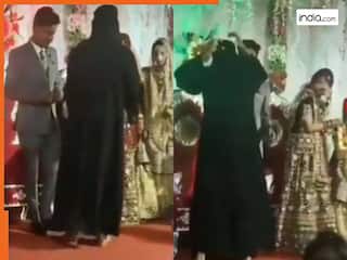 Bride Groom Video: बुर्के में दूल्हे के पास पहुंच गई लड़की, फिर दुल्हन के सामने जो किया सोच नहीं सकते | देखें वीडियो