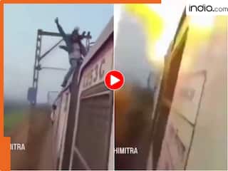 ट्रेन की छत पर स्टंट करना पड़ा भारी! बिजली हाई वोल्टेज तार छूते ही हुआ धमाका, Viral Video देख कांप जाएंगे आप