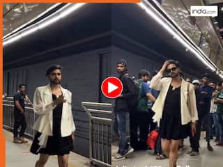 Metro Ka Video: मेट्रो स्टेशन पर स्कर्ट पहनकर घूमता दिखता शख्स, अदाएं ऐसी लड़कियां भी देखती रह गईं | देखें वीडियो