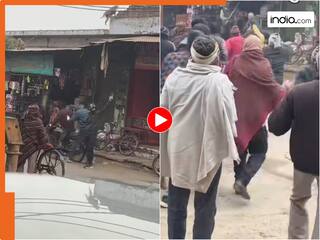 दिन दहाड़े बंदूक की नोक पर युवक लूट रहे थे दुकान, भीड़ ने सिखाया ऐसा सबक पहुंच गए अस्पताल...! देखें Viral Video