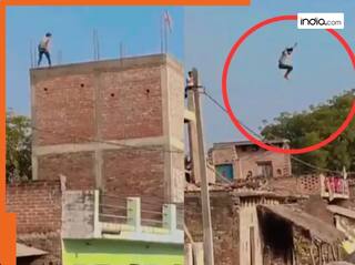 Viral Stunt Video: बिना डरे दो मंजिला इमारत से कूदा शख्स, फिर जो हुआ देख कांपे लोग | देखें वीडियो
