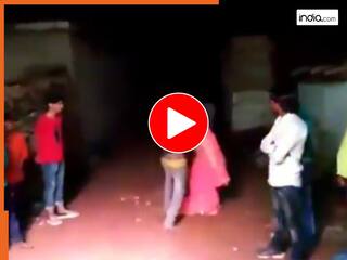 Husband Wife Ka Video: पत्नी को डांस करता देख पति भी मैदान में कूद गया, फिर नाचते-नाचते ही शुरू कर दी पिटाई | देखें वीडियो