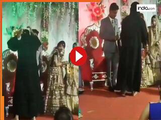 Bride Groom Video: बुर्के में दूल्हे के पास पहुंच गई लड़की, फिर दुल्हन के सामने जो किया हिल गए सभी | देखें वीडियो