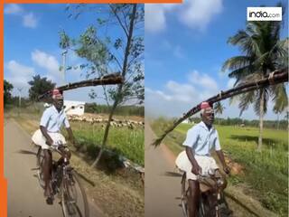Viral Video Today: जिंदगी में नहीं देखा होगा ऐसा बैलेंस, सिर पर रखी गन्ने की गठरी और दौड़ा दी साइकिल | देखें वीडियो