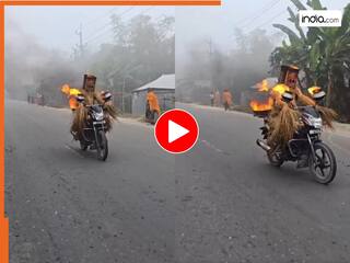 Stunt Ka Video: शरीर में आग लगाकर बाइक दौड़ाने लगा शख्स, खतरनाक सीन देख आंखें फटी रह जाएंगी | देखें वीडियो