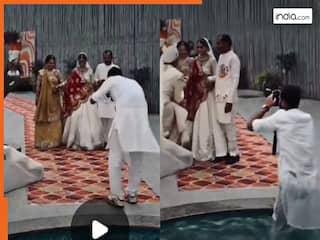 Bride Groom Video: दुल्हन की खूबसूरत फोटो खींच रहा था कैमरामैन, मगर तभी ऐसा गिरा लोग उसकी ही फोटो खींचने लगे