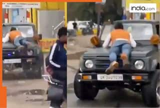 Jeep driver hits e-rickshaw, drags injured man on bonnet in Rampur, Uttar Pradesh; bystanders scream in fear | Watch viral video