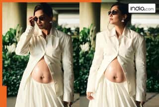 Sonam Kapoor steps out in elegant all-white look, proudly flaunts baby bump during Mumbai outing - See pics