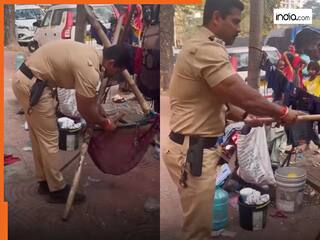 Viral Video Today: सड़क से मासूम का झूला हटाने लगा पुलिसकर्मी, फिर जो किया दिल हार गया इंटरनेट | देखें वीडियो