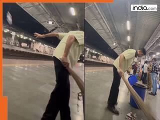 Viral video from Mumbai’s Dadar railway station sparks outrage - Cleaner caught tossing bottles onto tracks!