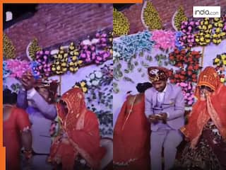 Bride Groom Video: खुद की शादी में पैसे लूटने लगा दूल्हा, दुल्हन तो देखते ही हिल गई | देखें वीडियो