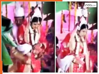 Bride Groom Video: दुल्हन को गोद में उठाने की गलती कर बैठा दूल्हा, मेहमानों के सामने हो गई गजब बेइज्जती | देखें वीडियो