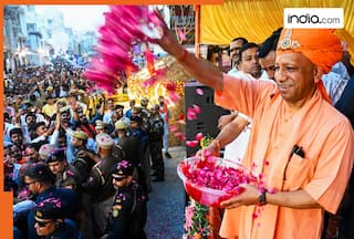 CM Yogi plays 'Phoolon ki Holi' at Bhakt Prahlad procession, showers flowers on devotees